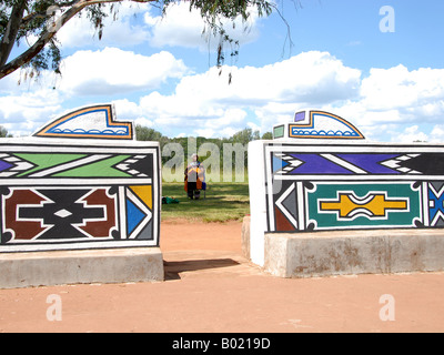 Two Ndebele woman in their traditional clothing in the museum village of Botshabelo in South Africa near Middelburg. Stock Photo