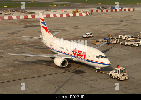 CSA Czech Airlines Boeing 737 being pushed back by airport tug vehicle Stock Photo