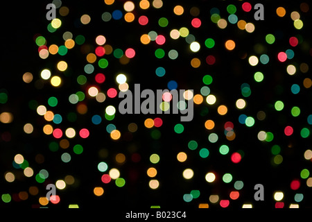 Abstract background of multi-colored streaked Christmas lights. Stock Photo