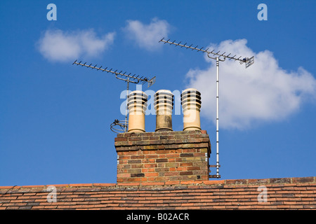 TV aerials on a chimney, UK. Stock Photo