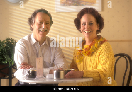 Senior couple in a lunchroom Stock Photo
