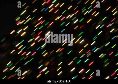 Abstract background of multi-colored blurred Christmas lights. Stock Photo