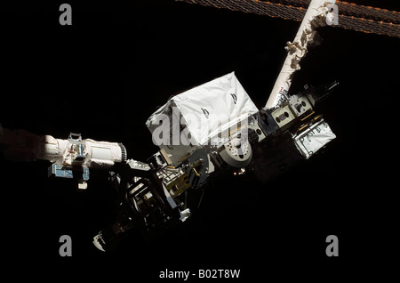 Space Shuttle Endeavour's Remote Manipulator System robotic arm. Stock Photo