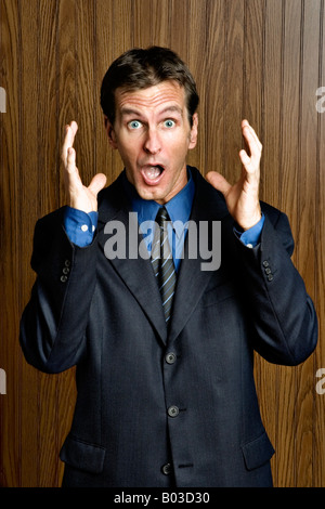 Man looking frightened or scared Stock Photo