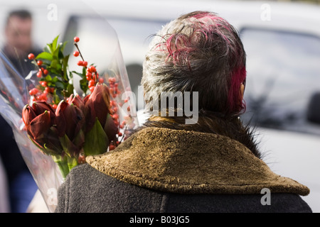 Woman in Columbia Road Flower Market, London Stock Photo