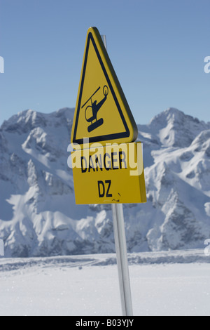 Helicopter landing site Danger sign in mountains Stock Photo