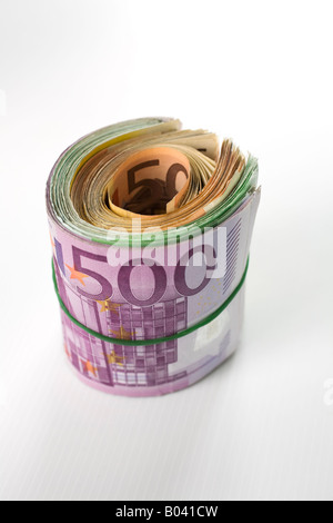 Euro 50 value banknotes roll with rubber on gray background Stock Photo ...