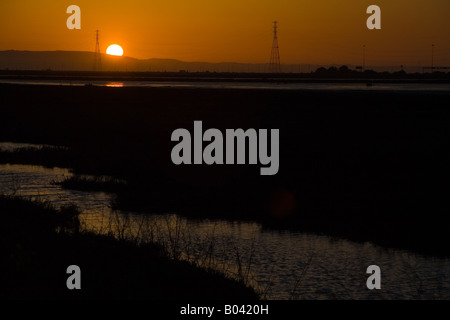 sunset at Eden Landing wetland area, Hayward, California Stock Photo