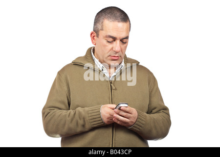 Casual man sending sms with cell phone over a white background Stock Photo