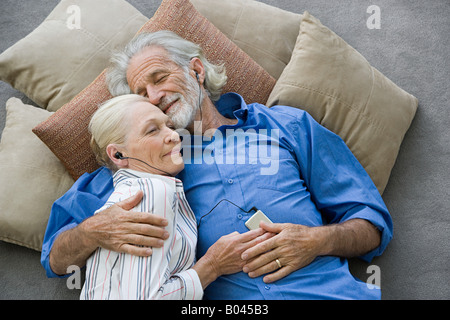 Senior couple with mp3 player Stock Photo