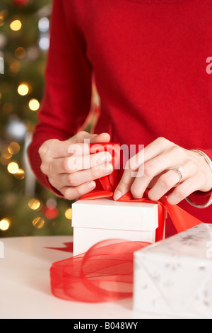 Woman Wrapping Christmas Present