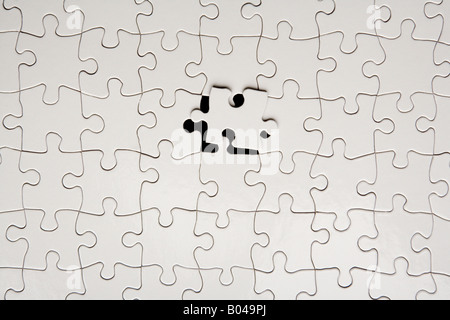 Last piece of jigsaw puzzle Stock Photo