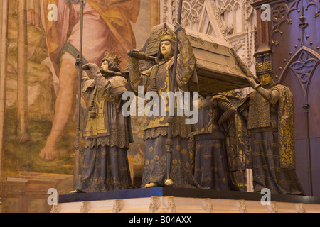 Tomb of Christopher Columbus at the door of the Prince inside the Seville Cathedral and La Giralda, a UNESCO World Heritage Site Stock Photo