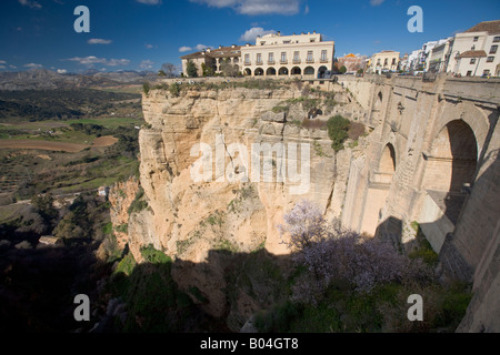 Puente Nuevo spanning El Tajo Gorge and Rio Guadalevin (River) with the Parador de Ronda perched on the edge of gorge Stock Photo