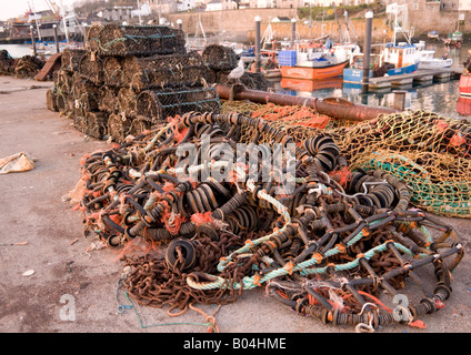 Fishing gear at Newlyn Harbour, Cornwall in early morning light Stock Photo