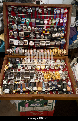 Watches on display by street trader, Port Louis market, Mauritius Stock