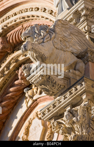 Details of the facade of the Siena Duomo in the historic old town district in the City of Siena, a UNESCO World Heritage Site Stock Photo