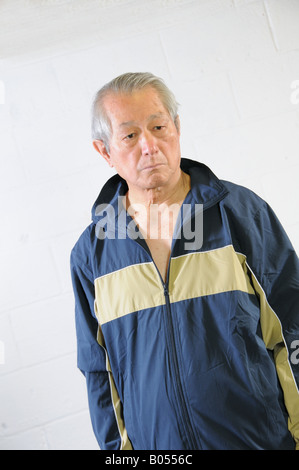 senior asian man looking depressed Stock Photo