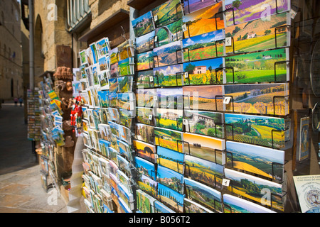 Souvenir shop displaying postcards outside in the City of Volterra, Province of Pisa, Region of Tuscany, Italy, Europe. Stock Photo