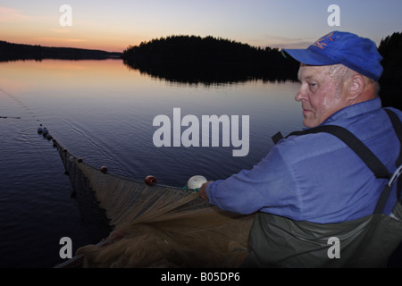 fishing  in Finnish mid summer night, Finland Stock Photo
