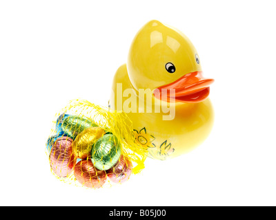 Money Pot with Chocolates Stock Photo