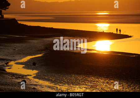 Fisherman in Arnside Bay, Cumbria. Stock Photo