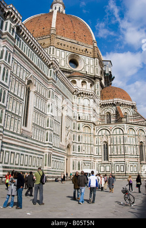 Side view of il Duomo in Florence with red tiled roof of dome against blue sky Stock Photo