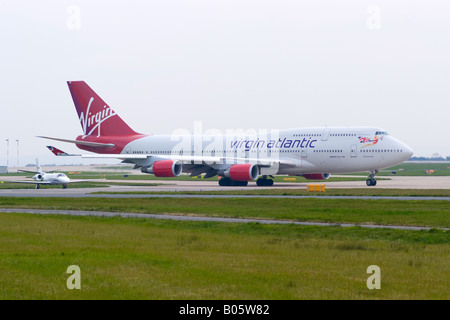 Virgin Atlantic Boeing 747-443 Taxiing Out for Take-off at Manchester Ringway Airport Greater Manchester England United Kingdom Stock Photo