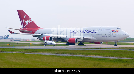 Virgin Atlantic Boeing 747-443 Taxiing Out for Take-off at Manchester Ringway Airport Greater Manchester England United Kingdom Stock Photo