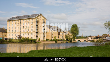 A view of the old mill on the river Ouse and Bridge, St Ives, Cambridgeshire. The mill has now been converted, and extended. Stock Photo