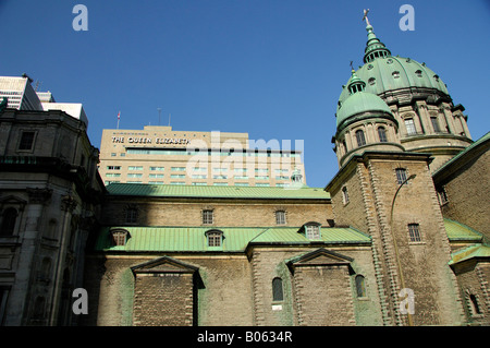 Canada, Quebec, Montreal. Mary Queen of the World Cathedral. The Queen Elizabeth hotel in distance. Stock Photo