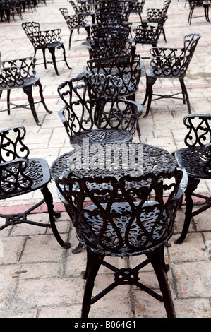 Wrought iron furniture on the outdoor cafe patio Stock Photo