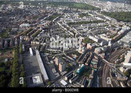Aerial view north west of Victoria Train Station railway lines inner city buildings Chelsea Barracks Hyde Green Park London SW1 Stock Photo