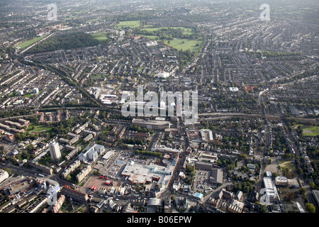 Aerial view south east of Peckham Bus Station Peckham Rye Common railway lines suburban houses tower blocks London SE15 SE22 UK Stock Photo