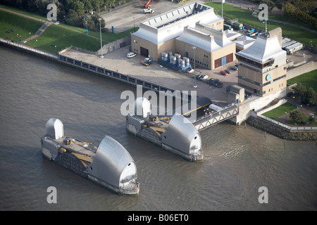 Aerial view south east of River Thames Thames Flood Barrier Barrier Control Building New Charlton London SE7 UK Stock Photo