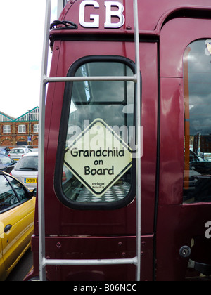 Land Rover parked at the Macarthru Glen shopping with Grandchild On Board sign in the rear window Swindon England UK Stock Photo