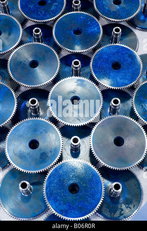 Generic blue circular gears form a pattern Stock Photo