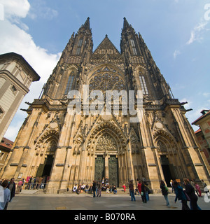 Square panoramic of the front entrance to St Vitus's Cathedral in the sunshine with a queue of tourists waiting to get in. Stock Photo