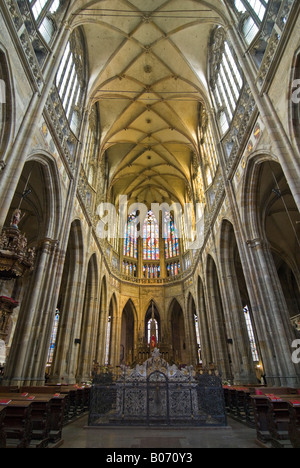 Vertical wide angle of the east nave, altar and vaulted ceiling inside St Vitus's Cathedral. Stock Photo