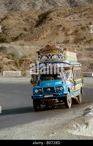 Pakistan NWFP Khyber Pass decorated bus climbing road to the Pass Stock Photo