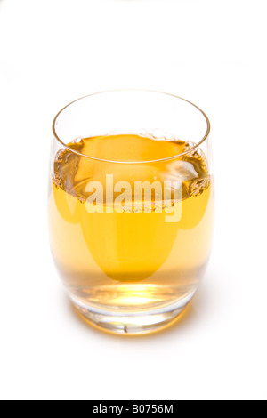 Glass of apple juice isolated on a white studio background. Stock Photo