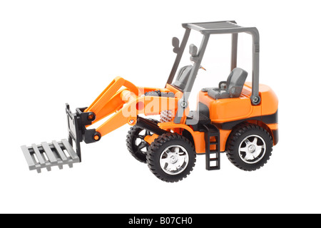 Plastic toy tractor with front end pallet fork attachment Stock Photo