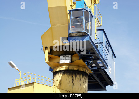 Close-up of driver's cab of a crane at freight harbour / Nahaufnahme der Fahrerkabine eines Krans in Frachthafen Stock Photo