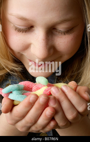 Girl with sweets Stock Photo