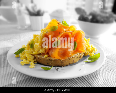 Smoked salmon and scrambled egg on a bagel Stock Photo