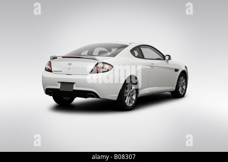 2008 Hyundai Tiburon GS in White - Rear angle view Stock Photo