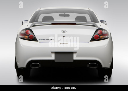 2008 Hyundai Tiburon GS in White - Low/Wide Rear Stock Photo