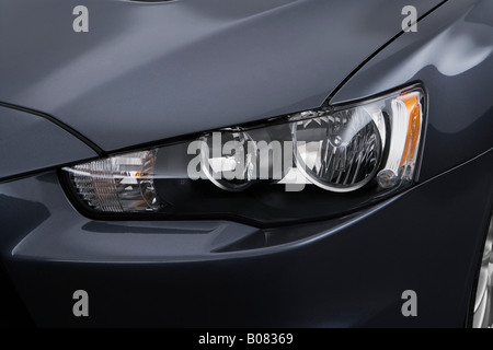 2008 Mitsubishi Lancer Evolution in Gray - Headlight Stock Photo