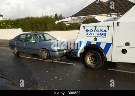 Vauxhall Cavalier being towed away after it was stolen in November 2007 Stock Photo