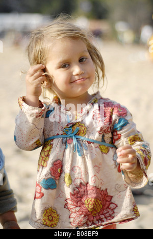 Portrait of a beautiful and tender mixed race small girl Stock Photo